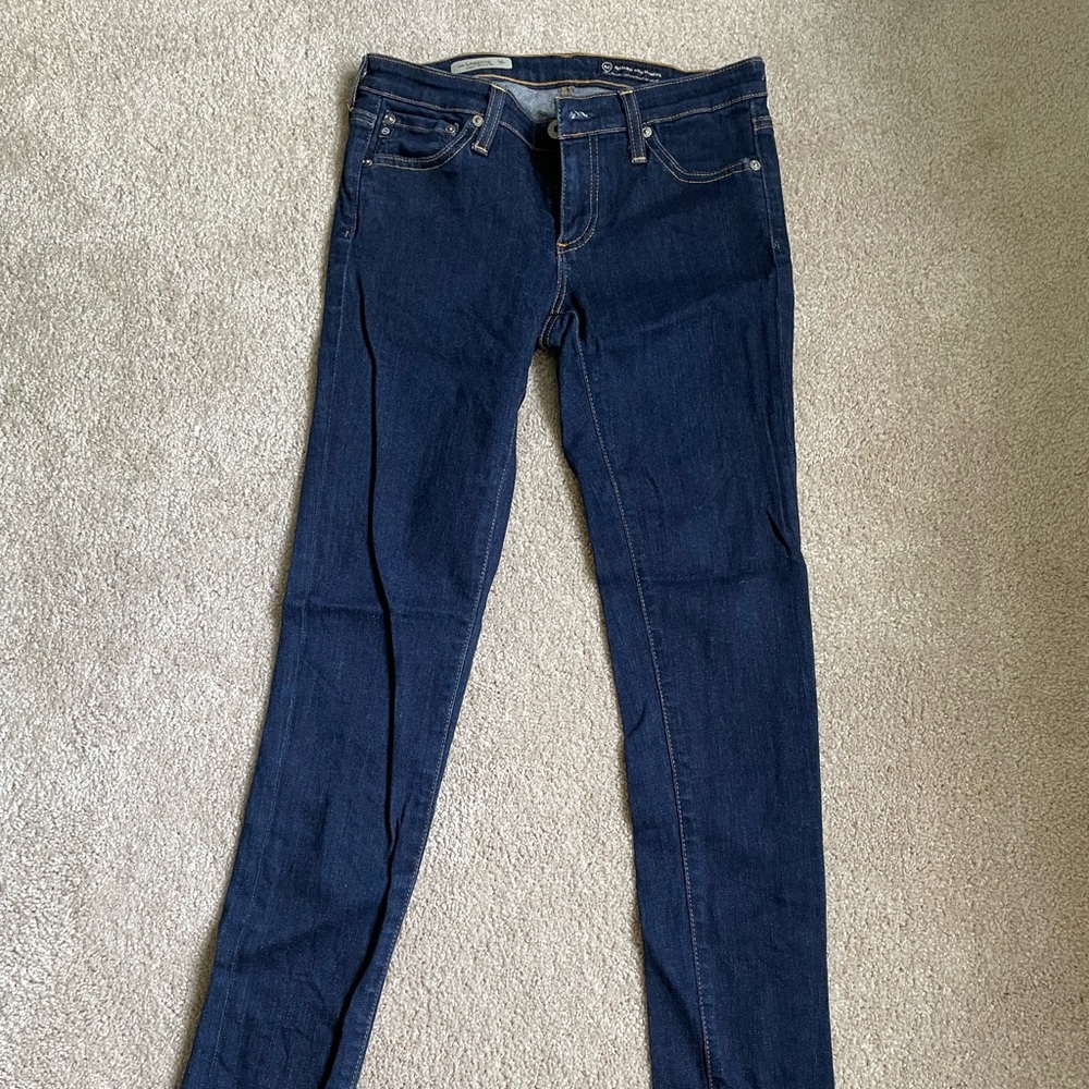 AG low-rise super skinny dark wash jeans. Size 27R.